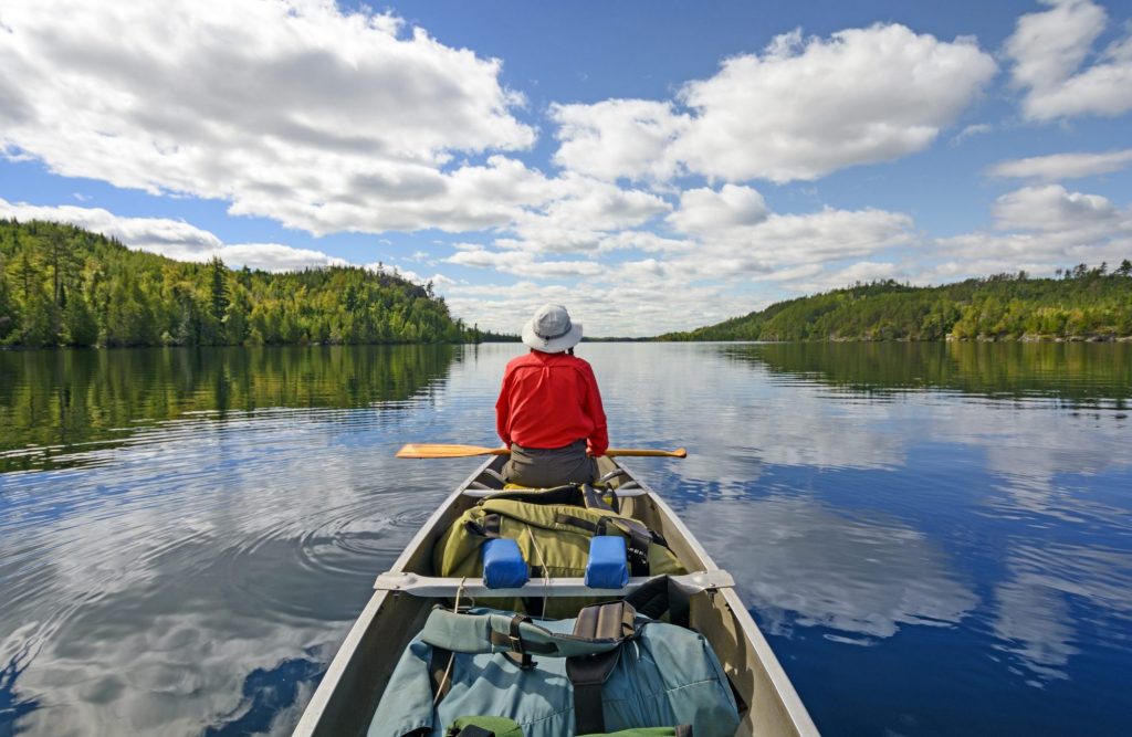 Person in a canoe in the Boundary Waters Canoe Area Wilderness BWCA