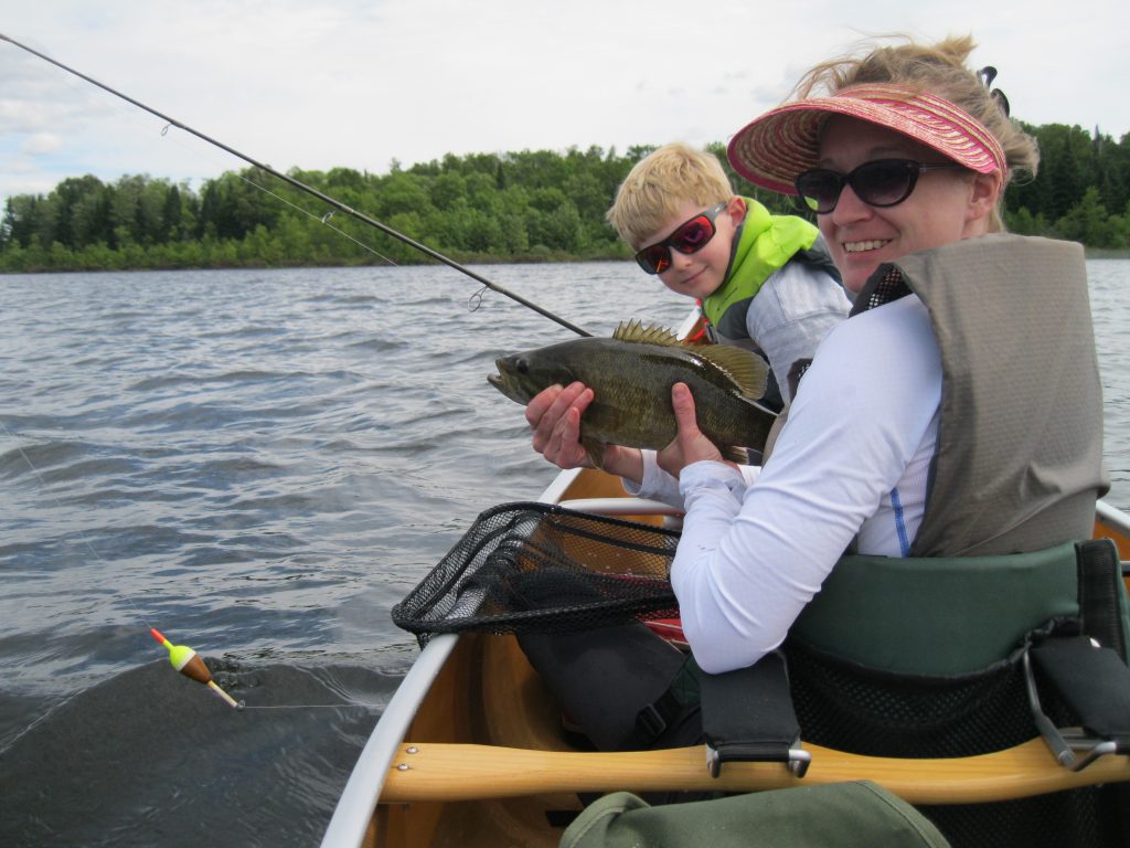 smallmouth bass caught in canoe on the inland lakes of the Superior National Forest