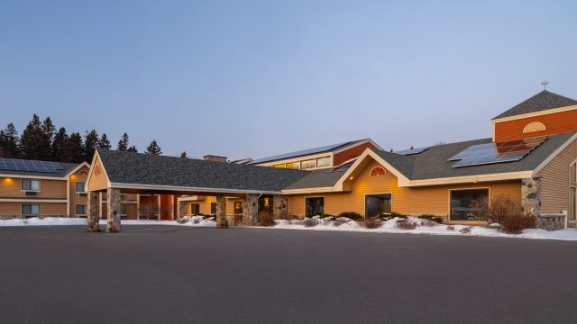 Exterior-Dusk – AmericInn Tofte