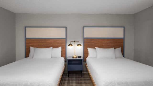 SNQ4-2-Queen-Beds-Suite-Pet-FriendlyRoom-223-2 – AmericInn Tofte